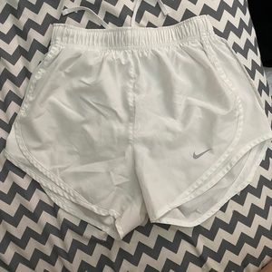 White Nike shorts